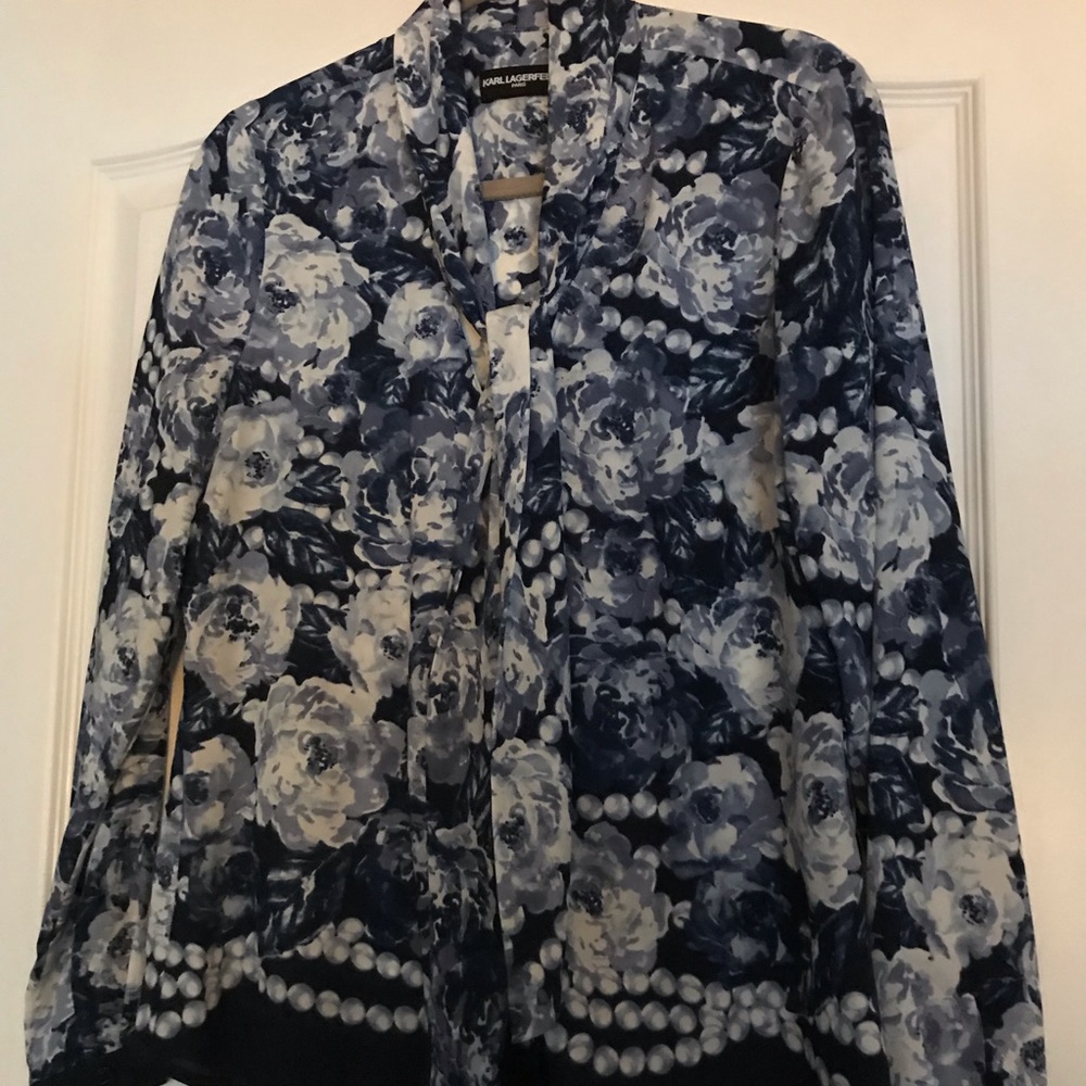 Neck-tie blouse.